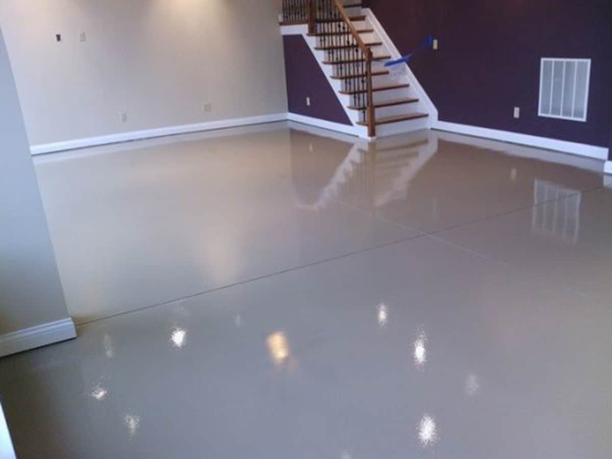 Basement floor epoxy coating in Knoxville TN — glossy solid color epoxy in finished basement